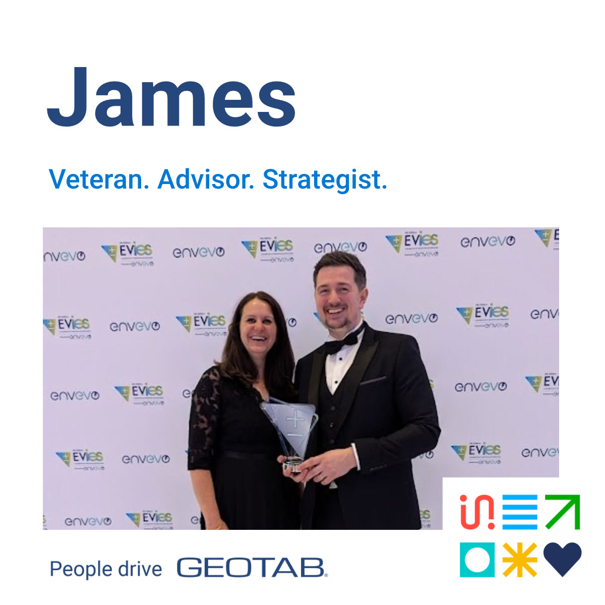 James holding an award